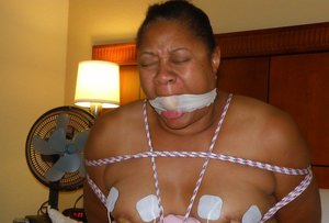 Black Fox Fetish xxx picture collection featuring juvenile lady in fetish bdsm session